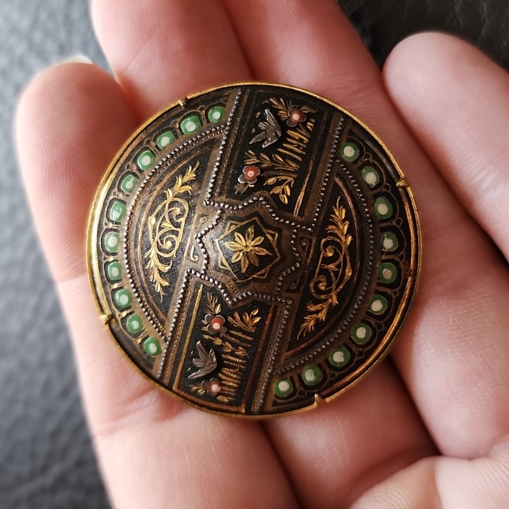 VTG brooch